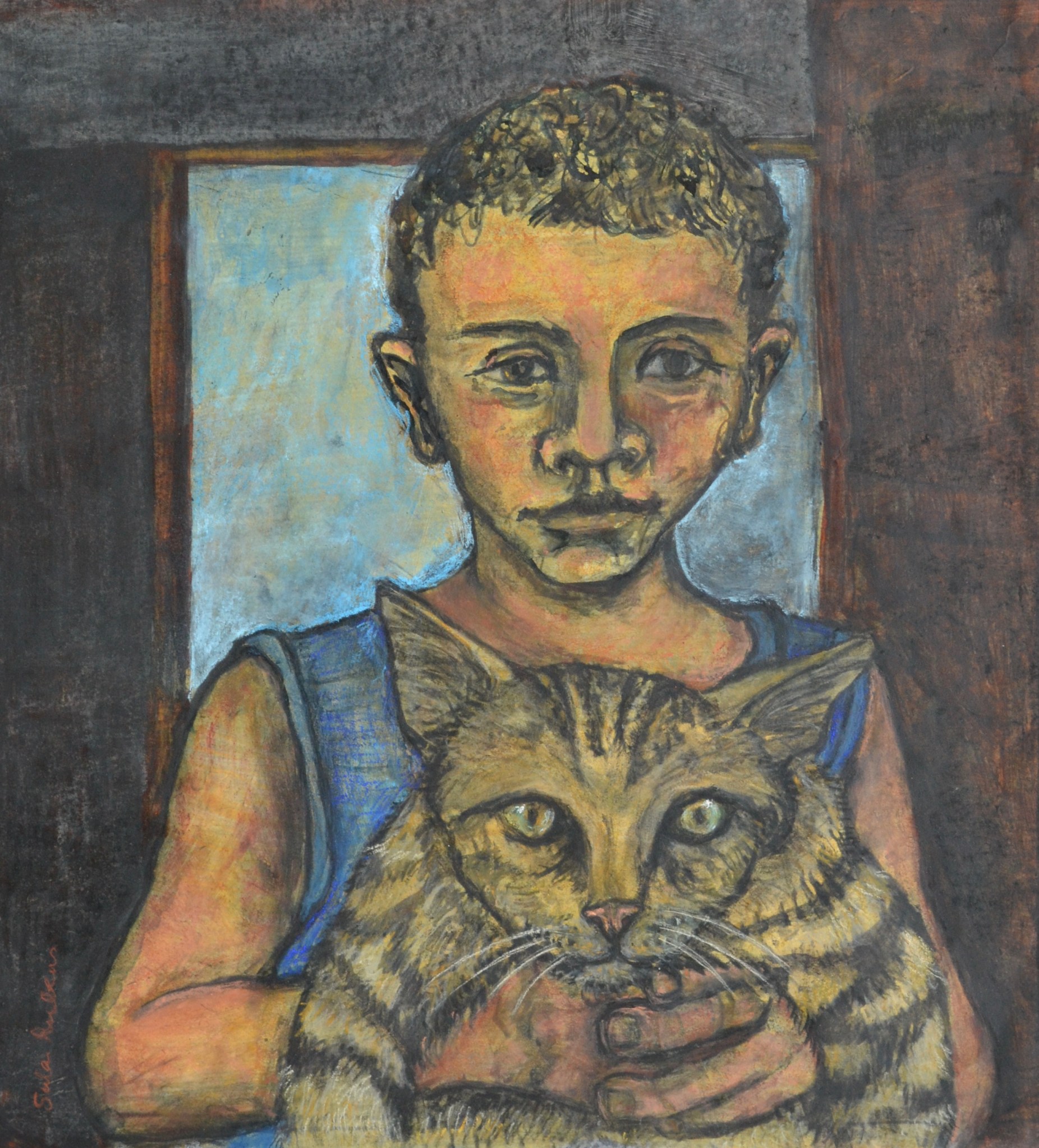 Fadi holding his Cat Aleppo